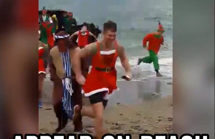 Santa And Jesus Marines Appear On Beach