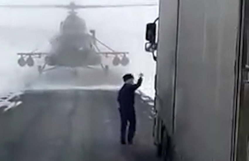 Russian Military Helicopter Lands For Directions