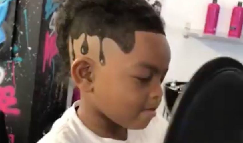看黑人小孩如何剪出一顆水滴頭