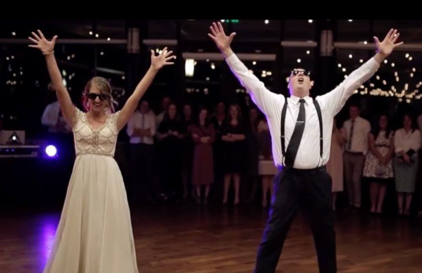 Father and daughter bossing their wedding dance