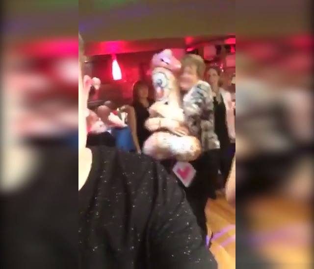 Woman Hugging Penis On Dancefloor