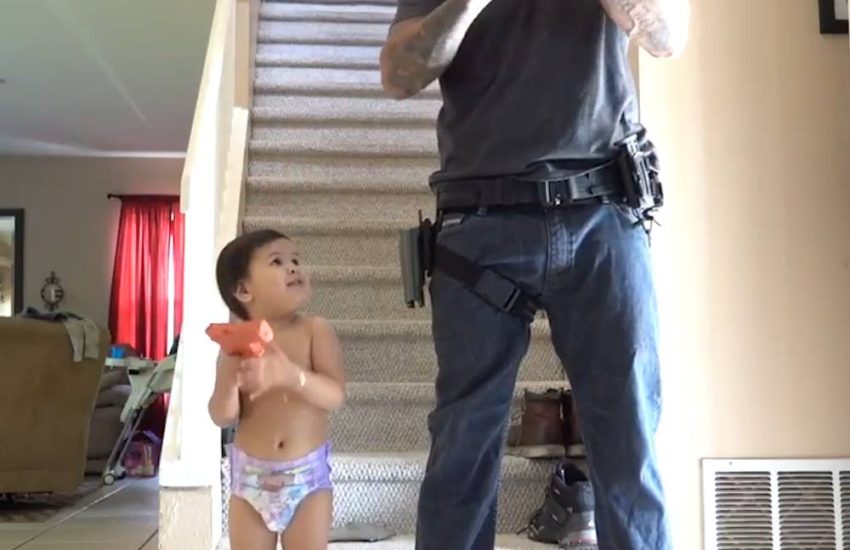 Dad And Son Shooting Practice